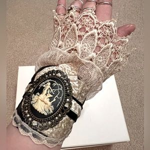 ✨One of a kind lovely cream lace & black faux leather cuff with cameo & leaves✨